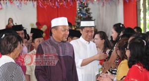 Unik, Bupati Bolsel Gunakan Jubah Muslim Ikuti Pra Natal